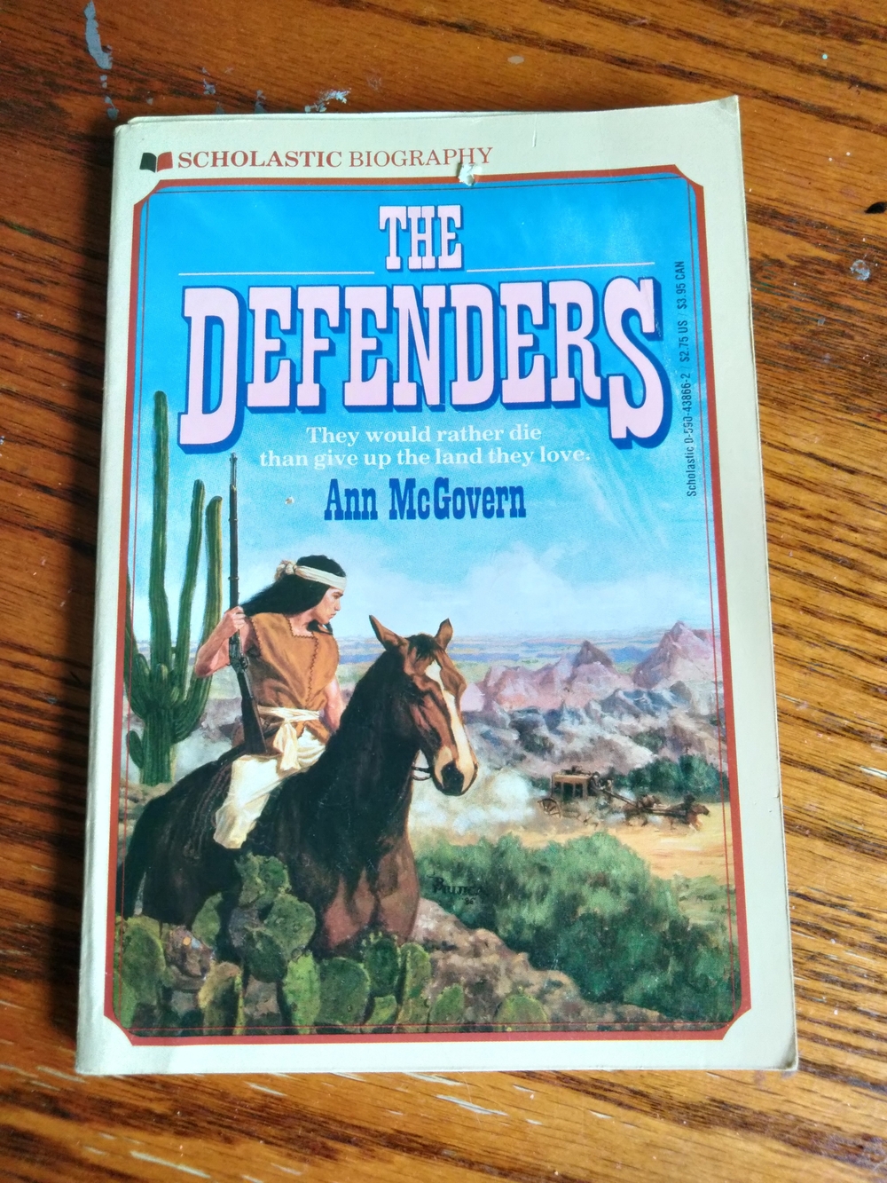 The Defender, Scholastic Biography Paperback by Ann McGovern